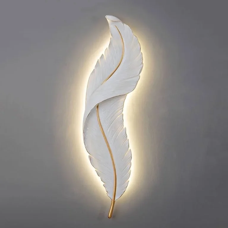 A golden feather wall light.